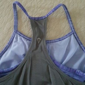 Ivivva tank top on purple and grey